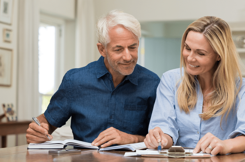 man and woman with paperwork